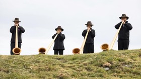 Alphorn blowers on the last day of the International Alphorn Festival on the alpine pasture of Tracouet in Nendaz, in southern Switzerland, July 26, 2026. REUTERS/Pierre Albouy