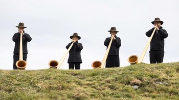 Alphorn blowers on the last day of the International Alphorn Festival on the alpine pasture of Tracouet in Nendaz, in southern Switzerland, July 26, 2026. REUTERS/Pierre Albouy