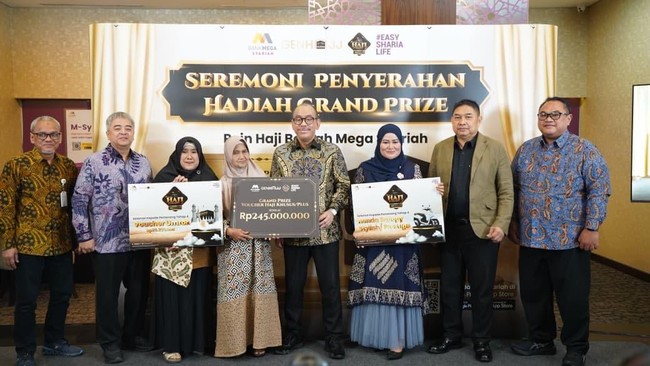 Bank Mega Syariah menyerahkan hadiah Grand Prize Program Poin Haji Berkah Mega Syariah berupa Voucher Haji Khusus/Plus senilai Rp245 juta kepada Ibu Mardiah, nasabah KCP Tangerang City. Penyerahan hadiah tersebut menjadi puncak dari program loyalti n