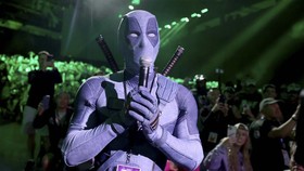 SAN DIEGO, CALIFORNIA - JULY 25: Ryan Reynolds in Deadpool cosplay speaks from the audience during the Marvel Studios Panel at 2026 San Diego Comic-Con on July 25, 2026 in San Diego, California.   Jesse Grant/Getty Images for Disney/AFP (Photo by Jes