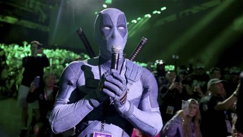SAN DIEGO, CALIFORNIA - JULY 25: Ryan Reynolds in Deadpool cosplay speaks from the audience during the Marvel Studios Panel at 2026 San Diego Comic-Con on July 25, 2026 in San Diego, California.   Jesse Grant/Getty Images for Disney/AFP (Photo by Jes