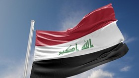 Iraq flag is waving at a beautiful and peaceful sky in day time while sun is shining. 3D Rendering