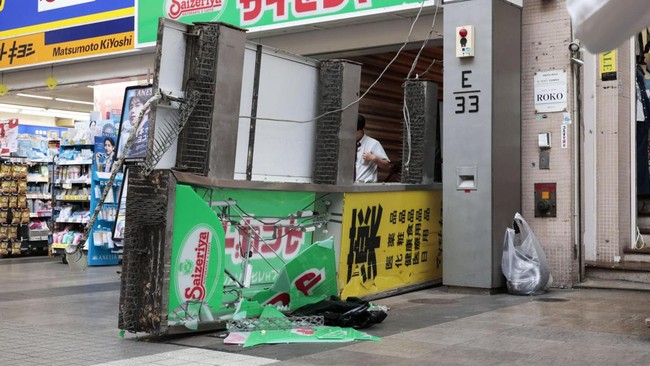 A damaged fallen signboard outside a Saizeriya restaurant after an earthquake with a preliminary magnitude of 7.1 struck Japan's southern Kumamoto prefecture, in Kumamoto, July 28, 2026. Kyodo/via REUTERS