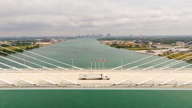 A drone view shows a vehicle crossing the $4.7 billion Gordie Howe International Bridge, connecting Windsor, Ontario and Detroit, Michigan, the day after it opened in Windsor, Ontario, Canada, July 28, 2026.  REUTERS/Carlos Osorio
