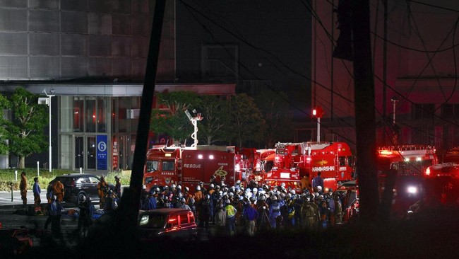 Rescue workers conduct search and rescue operations at the damaged Aeon Mall shopping centre, where, according to local media, an explosion occurred after an earthquake with a preliminary magnitude of 7.1 struck Japan's southern Kumamoto prefecture,