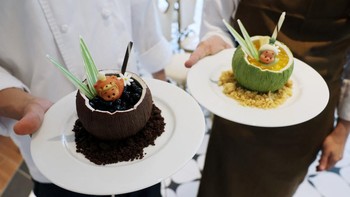 Chefs present the Twinkle Twinkle Tangy Coconut Mousse and Twinkle Twinkle Sweet Coconut Mousse desserts at Pop Mart's first international bakery during their media day at Resorts World Sentosa in Singapore July 29, 2026. REUTERS/Edgar Su