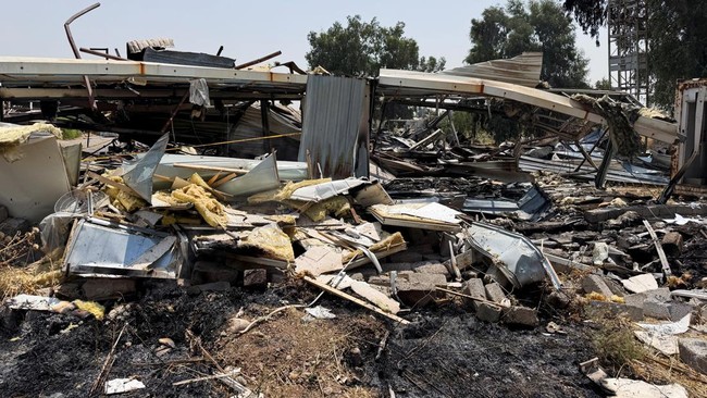 Damage at a site belonging to Iraq's Popular Mobilization Forces (PMF) following airstrikes that the PMF said were carried out by U.S. and Saudi forces, in Bartella, Nineveh province, Iraq, July 29, 2026. Picture taken with a mobile phone. REUTERS/Kh