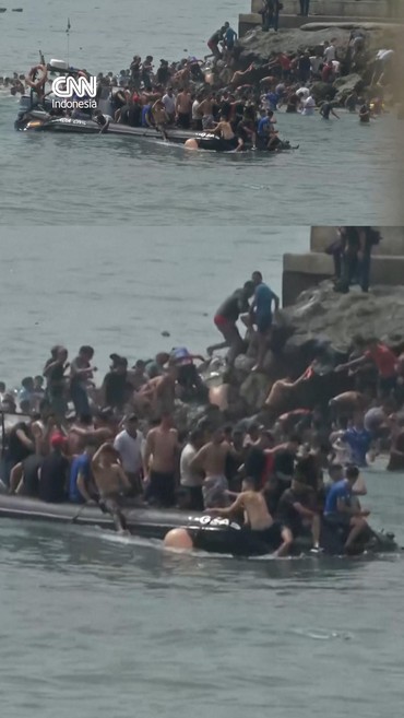 Ratusan migran dari Maroko menyeberang laut untuk memasuki wilayah Ceuta milik Spanyol secara ilegal pada Kamis (30/7).