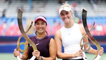 WASHINGTON, DC - AUGUST 01: Aldila Sutjiadi of Indonesia and Erin Routliffe of New Zealand pose with their women's doubles trophy following a championship match against Makoto Ninomiya of Japan and Andreja Klepac of Slovenia on day six of the Mubadal