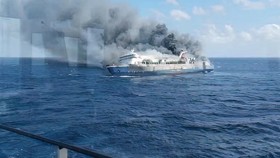This screen grab from a handout video taken and released on August 2, 2026, by Indonesia's National Search and Rescue Agency (Basarnas), shows the passenger ship Mutiara Sentosa 2 catching fire in the waters off Madura island, East Java. Five people