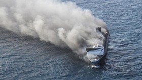 This aerial picture shows the passenger ship Mutiara Sentosa 2 catching fire in the waters off Madura island, East Java, on August 2, 2026. Five people have been found dead, 41 are missing and 225 were rescued after an Indonesian ferry caught fire wh