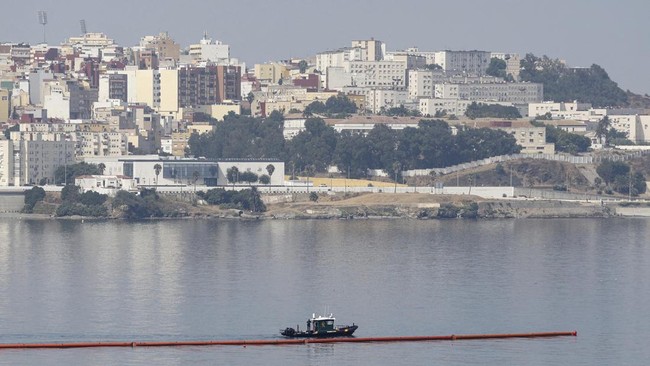 Floating barriers are seen installed on the maritime border between Spain's North African enclave of Ceuta and Morocco in the aftermath of the sudden influx of tens of thousands of migrants into Ceuta, as seen from the outskirts of the Moroccan town