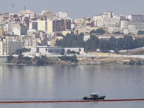 Floating barriers are seen installed on the maritime border between Spain's North African enclave of Ceuta and Morocco in the aftermath of the sudden influx of tens of thousands of migrants into Ceuta, as seen from the outskirts of the Moroccan town