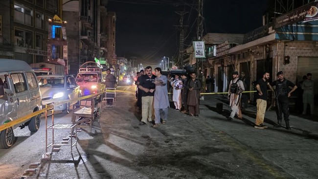 Police personnel cordon off a street following a suicide bombing during a protest in Pakistan's Swat district on August 2, 2026. A suicide bomber attacked a busy area near a police station during a protest in northern Pakistan's Swat district, killin
