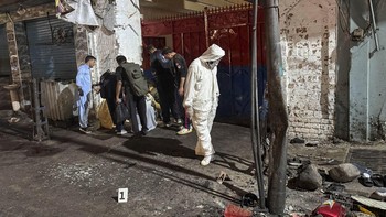 Police officials inspect the site following a suicide bombing during a protest in Pakistan's Swat district on August 2, 2026. A suicide bomber attacked a busy area near a police station during a protest in northern Pakistan's Swat district, killing s