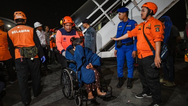 Survivors of the Mutiara Sentosa 2 ferry which caught fire in the waters off Madura island, East Java, on August 2, 2026, disembark at Tanjung Perak port in Surabaya early on August 3, 2026. An Indonesian ferry caught fire at sea on Sunday, killing f