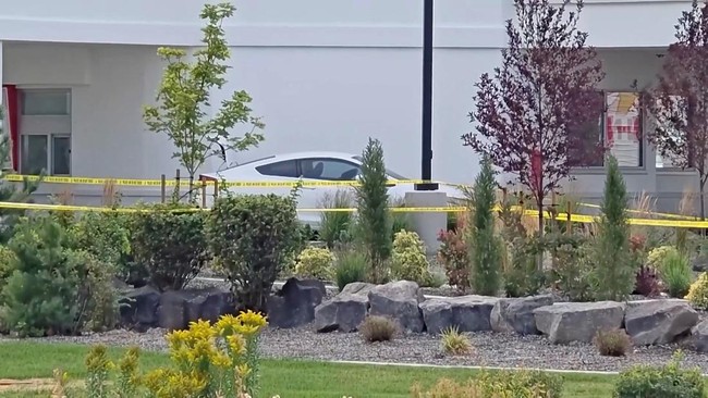 A vehicle behind yellow tape at the site of a fatal shooting incident in Twin Falls, Idaho, U.S., August 1, 2026, in this still image obtained from a video. ABC AFFILIATE KIVI/Handout via REUTERS