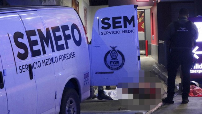 SENSITIVE MATERIAL. THIS IMAGE MAY OFFEND OR DISTURB    Forensic technicians and police officers work at the crime scene where Mexican social media influencer Cesar Gastelum, known for his comedy videos and followed by nearly 600,000 people on TikTok