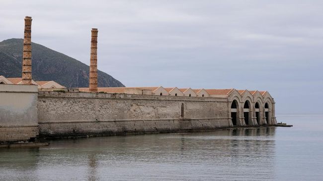 The former Florio tuna-processing plant lines the waterfront in Favignana, Italy, May 5, 2021. Favignana was used as a filming location for Christopher Nolan’s "The Odyssey", released in Italy on July 16, 2026. REUTERS/Igor Petyx
