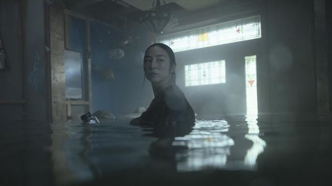 The Last House. Greta Lee as Ann in The Last House. Cr. Chris Baker/Netflix © 2026