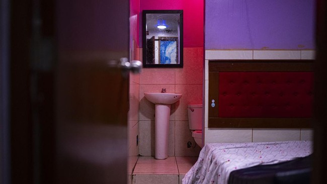 View inside La Miel brothel during an anti-human trafficking police operation called Sodom and Gomorrah, in the Independencia district, on the northern outskirts of Lima on July 31, 2026 late night. (Photo by ERNESTO BENAVIDES / AFP)