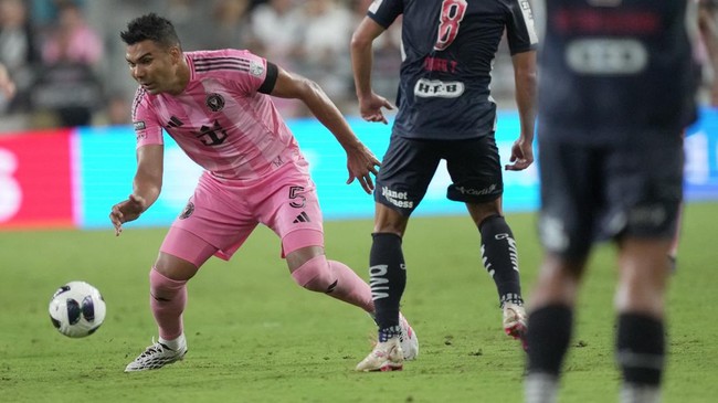 Aug 8, 2026; Miami, FL, USA; Inter Miami CF midfield Carlos Casimiro (5) loses possession of the ball as Monterrey midfielder Oliver Torres (8) closes in during the second half of the Leagues Cup Phase One match at Nu Stadium. Mandatory Credit: Jim R