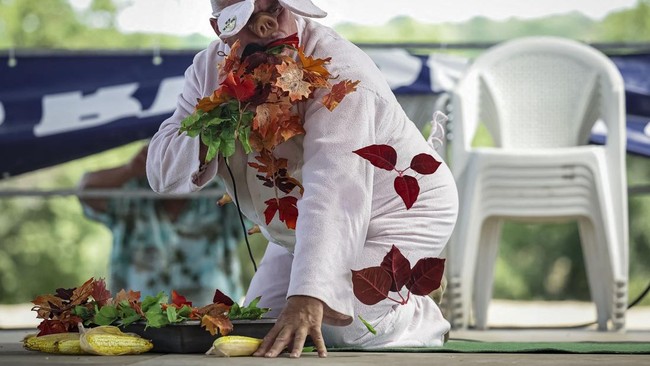 Noel Jamet, 10-time champion in the French pig-squealing championship, performs on stage at the 43rd edition of the Pig Festival, in Trie-sur-BaÔse, south-western France, on August 9, 2026. (Photo by Valentine CHAPUIS / AFP)