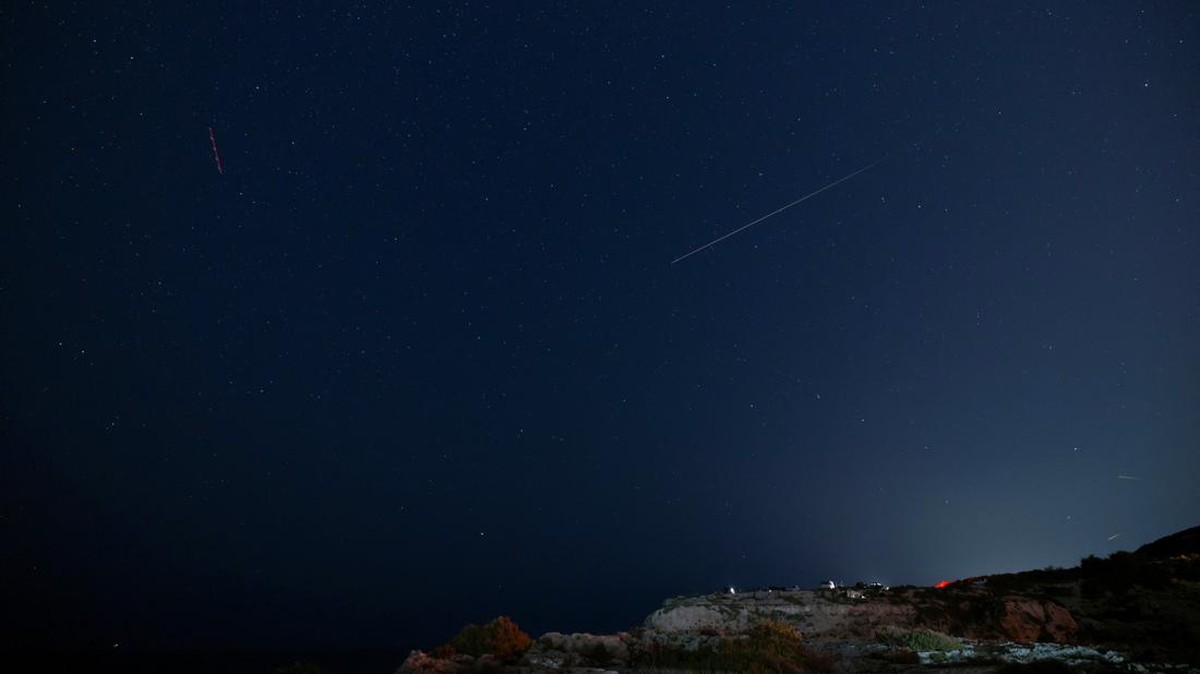 A meteor streaks across the night sky during the annual Perseid meteor shower at Migra l-Ferha, outside the town of Rabat, Malta August 13, 2026. REUTERS/Darrin Zammit Lupi
