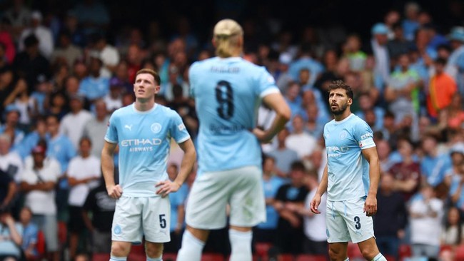 Soccer Football - FA Community Shield - Arsenal v Manchester City - Principality Stadium, Cardiff, Wales, Britain - August 16, 2026 Manchester City's Ruben Dias looks dejected after Arsenal's Martin Odegaard scores their third goal Action Images via