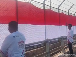 Bendera Merah Putih 180 Meter Membentang di Atas Bengawan Solo