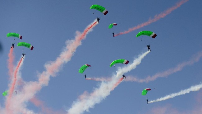 Indonesian military personnel perform skydiving during a ceremony marking the country's 81st Independence Day at the Presidential Palace in Jakarta, Indonesia, August 17, 2026. REUTERS/Ajeng Dinar Ulfiana