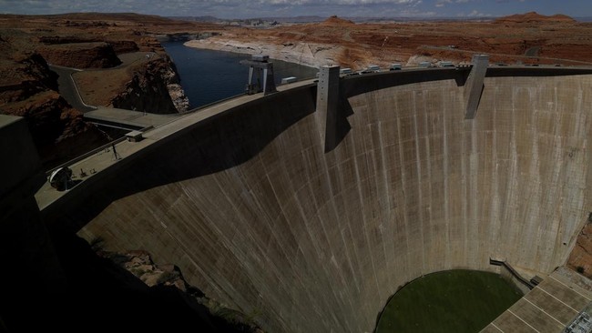 PAGE, ARIZONA - JULY 30: A view of the Glen Canyon Dam at Lake Powell on July 30, 2026 in Page, Arizona. In July, the combined water of Lake Mead and Lake Powell, the country's two biggest reservoirs, fell to their lowest levels since 1957. The unpre