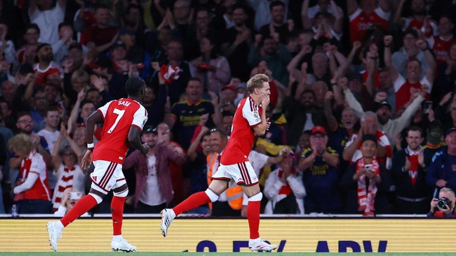 Soccer Football - Premier League - Arsenal v Coventry City - Emirates Stadium, London, Britain - August 21, 2026 Arsenal's Martin Odegaard celebrates scoring their third goal REUTERS/Hannah Mckay EDITORIAL USE ONLY. NO USE WITH UNAUTHORIZED AUDIO, VI