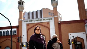 Muslims leave after the Eid Al-Fitr prayer, which  marks the end of the holy month of Ramadan, at Bradford Central Mosque in Bradford, northern England on May 13, 2021. (Photo by OLI SCARFF / AFP)