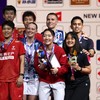Badminton - BWF World Championships - Indira Gandhi Indoor Stadium, New Delhi, India - August 23, 2026 France's Thom Gicquel and Delphine Delrue pose with their gold medals alongside China's Feng Yan Zhe and Huang Dong Ping with their silver medals,