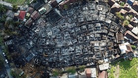 A drone view shows the aftermath of a fire at Sade, a traditional Sasak village that caught fire overnight in Lombok, West Nusa Tenggara province, Indonesia, August 23, 2026. REUTERS/Stringer