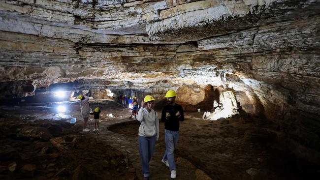 Tourists visit Vjetrenica Cave, a UNESCO World Heritage Site, where temperatures remain a constant 11 degrees Celsius (52 degrees Fahrenheit), to escape the summer heat as the Balkans endure repeated heatwaves, in Ravno, Bosnia and Herzegovina, July