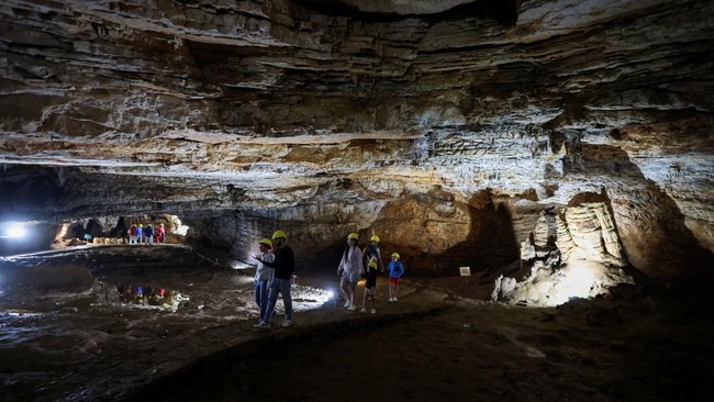 Tourists visit Vjetrenica Cave, a UNESCO World Heritage Site, where temperatures remain a constant 11 degrees Celsius (52 degrees Fahrenheit), to escape the summer heat as the Balkans endure repeated heatwaves, in Ravno, Bosnia and Herzegovina, July