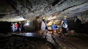 Tourists visit Vjetrenica Cave, a UNESCO World Heritage Site, where temperatures remain a constant 11 degrees Celsius (52 degrees Fahrenheit), to escape the summer heat as the Balkans endure repeated heatwaves, in Ravno, Bosnia and Herzegovina, July
