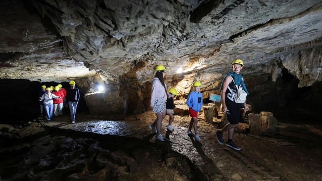 Tourists visit Vjetrenica Cave, a UNESCO World Heritage Site, where temperatures remain a constant 11 degrees Celsius (52 degrees Fahrenheit), to escape the summer heat as the Balkans endure repeated heatwaves, in Ravno, Bosnia and Herzegovina, July