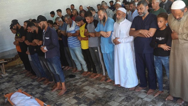 Mourners attend the funeral of 10-year-old Palestinian girl Amal Abu Khater, who was shot in the back while eating inside her family's tent and later died at Nasser Hospital in Khan Younis, according to medics and relatives, in the southern Gaza Stri