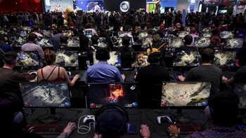 People play video games during Gamescom 2026, a computer and video game industry event, in Cologne, Germany August 26, 2026. REUTERS/Jana Rodenbusch