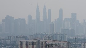 Kuala Lumpur's skyline is shrouded in haze from regional wildfires, as seen from Ampang, Malaysia, August 26, 2026. REUTERS/Hasnoor Hussain