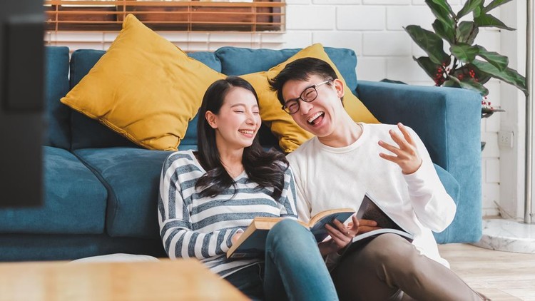 Asian couple man and woman talking working  spend time together at home&comma; Asian couple family lifestyle concept