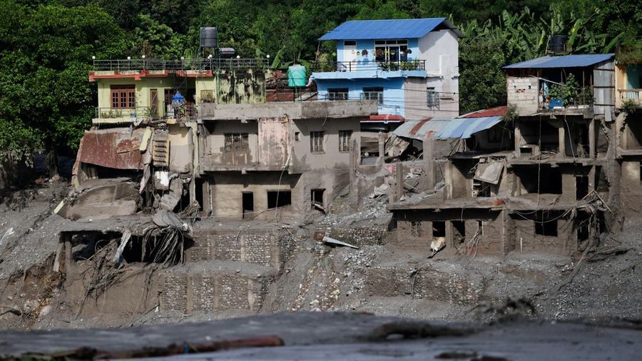 Rumah-rumah nan rusak akibat banjir luar biasa di Trishuli, Distrik Nuwakot, Nepal, pada 27 Agustus 2026.