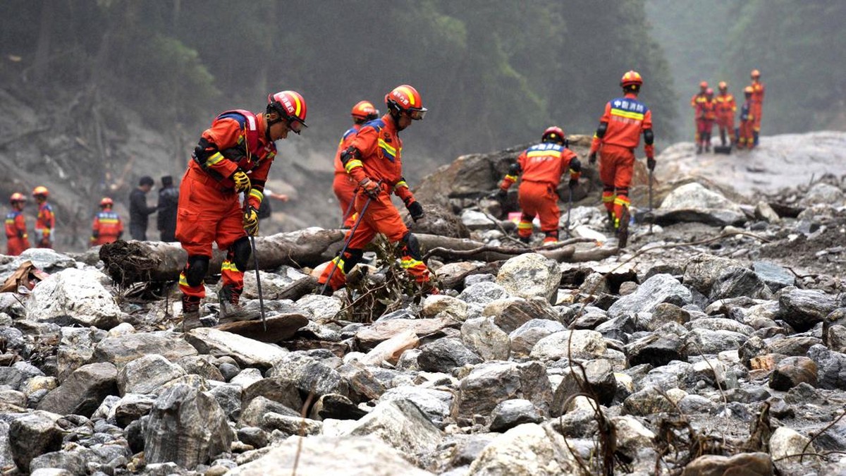 Firefighters conduct search and rescue operations along a river, after a mudslide in Gyirong county, Shigatse, Tibet Autonomous Region, China, August 29, 2026. cnsphoto via REUTERS