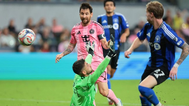 Aug 29, 2026; Miami, Florida, USA; Inter Miami CF forward Lionel Messi (10) scores against CF Montreal goalkeeper Thomas Gillier (31) during the second half at NU Stadium. Mandatory Credit: Sam Navarro-Imagn Images