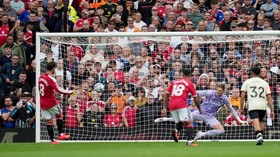 Soccer Football - Premier League - Manchester United v Ipswich Town - Old Trafford, Manchester, Britain - August 30, 2026 Manchester United's Bruno Fernandes scores their third goal from the penalty spot REUTERS/Jon Super EDITORIAL USE ONLY. NO USE W