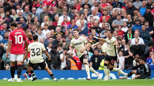 Soccer Football - Premier League - Manchester United v Ipswich Town - Old Trafford, Manchester, Britain - August 30, 2026 Ipswich Town's Leif Davis celebrates scoring their first goal REUTERS/Jon Super EDITORIAL USE ONLY. NO USE WITH UNAUTHORIZED AUD