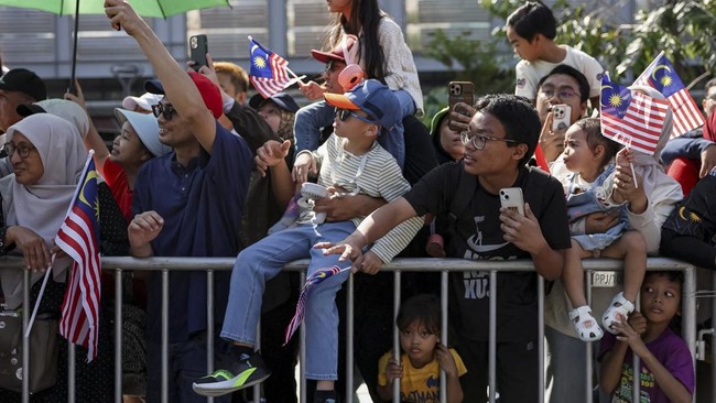 People gather for the 69th National Day celebration in Putrajaya, Malaysia, August 31, 2026. REUTERS/Hasnoor Hussain